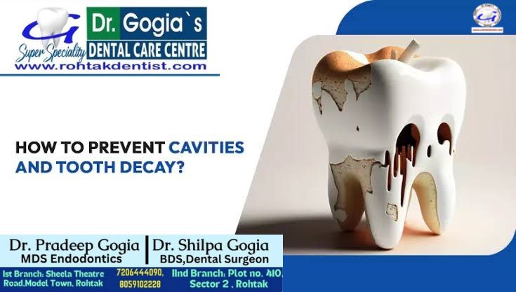 Dentist showing a patient how to prevent cavities and tooth decay with proper brushing and oral care techniques